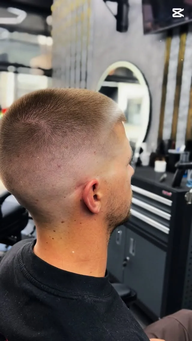 High skin-fade buzz cut
